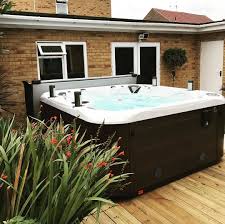 Loving These Photographs Of A Coast Spas Apex Hot Tub This Model Is From Our Traditional Spas Series Hot Tub Swim Spa Coast Spas Contemporary Living Room Sofa