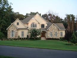 European Inspired Stone And Stucco Retreat Stucco Homes House Exterior Stucco Exterior
