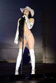 Miley Cyrus' sister Noah strips almost naked in glittering sheer bodysuit  as she performs at CMT Awards – The Sun | The Sun