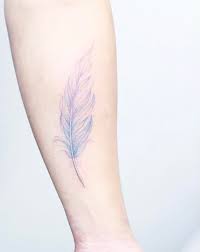 Delicate And Dreamy Pastel Tattoos Are A Whimsical Way To Adorn The Skin Pastel Tattoo Feather Tattoo Design White Feather Tattoos