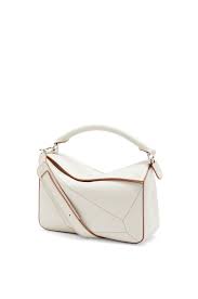 Designed by jonathan anderson, the iconic puzzle shoulder bag from spanish fashion house loewe showcases an innovative folding design that can be adapted for any outfit or occasion. Loewe Puzzle Bag Beige Buy Clothes Shoes Online