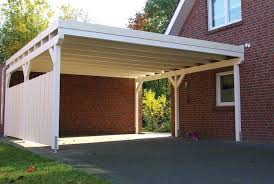 Ein Doppelcarport Aus Holz In Einem Zeitlosen Anstrich In Der Deckfarbe Weiss Zwei Autos Finden Unter Dem Flachdachcarpo Doppelcarport Carport Anbau Gartenhaus