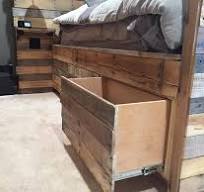 Reclaimed pallet wood bed frame with hidden drawers