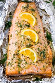 Cooking salmon in foil is a simple way to avoid washing extra dishes since the baking sheet would stay all clean. Salmon In Foil With Lemon And Dill Dinner At The Zoo