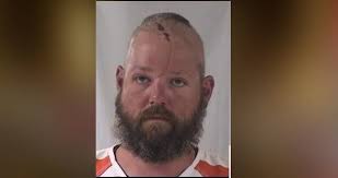 Suspect charged in May motorcycle pursuit and crash