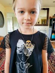 I carved this antler skull pendant for my daughter Robyn using wood carving  tools after she requested it. she is such a little goth child I really  enjoy her dark side. she's