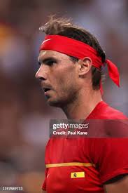 Ben McLachlan of Team Japan volley's the ball back over the net... News  Photo