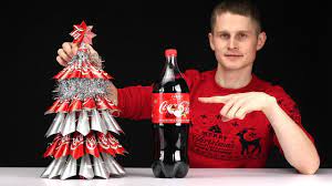 The 'santa packs' feature heritage sundblom imagery and are available in the usa, the uk, australia, hong kong, south africa. How To Make A Christmas Tree From Coca Cola Youtube