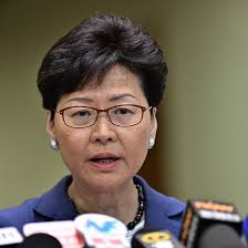 Hong Kong leader says campus protesters must surrender peacefully