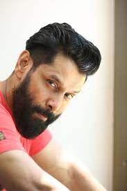 Chiyaan Vikram Latest Photo Shoot Stills In 2021 Mens Hairstyles Thick Hair Long Thick Hair Men Hair Tint