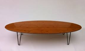 An oval coffee table can soften the look of a living room or family room as it offers added storage for drinks, snacks, magazines, and books. 25 Elegant Oval Coffee Table Designs Made Of Glass And Wood Mid Century Coffee Table Surfboard Coffee Table Mid Century Modern Coffee Table