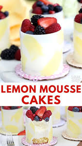 Lemon Mousse Cakes In White Chocolate Shells Are Miniature Desserts Made With Lemon Cake Lemon Mousse And Fresh Berri Desserts Lemon Mousse Lemon Mousse Cake