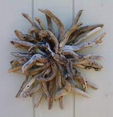 Sunburst Driftwood Wall Hanging Round Wood Sculpture Coastal Etsy Driftwood Wall Art Driftwood Art Driftwood Sculpture