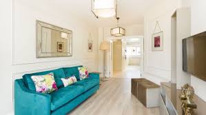 Looking for ideas on how to make a statement on your living room wall using wallpaper? Design Dilemma How To Create Focus In A Living Room With No Fireplace