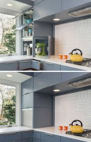 In this space, wood and simple brick complement the small space, providing prep areas and a base for the grill. Kitchen Design Idea Store Your Kitchen Appliances In An Appliance Garage Kitchen Appliance Storage Appliance Garage Kitchen Large Appliances