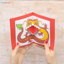 The first set of pop up cards i am sharing with you, take a 2 d image and with a fold, turn into into a clever 3d pop up card. Chinese Dragon Pop Up Card Template Easy Peasy And Fun