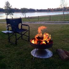 Enjoy my redneck fire pit. Hillbilly Black Steel Compact Fire Dish Snowys Outdoors