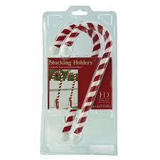 To stay upright on some mantels, a stocking will need to be hung from the candy cane stocking holder. Haute Decor Candy Cane Stocking Holder 2 Pack Velvet Finish Wowooo