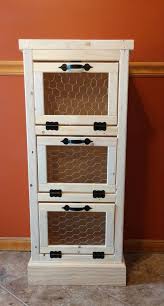 This item features a finished front and also a front angled bin for storage. 62 Potato Bin Ideas Potato Bin Vegetable Bin Potato And Onion Bin
