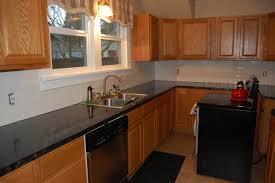 Sprays on in a wider fan to complete your. Painting Kitchen Cabinets Diy Project Aholic