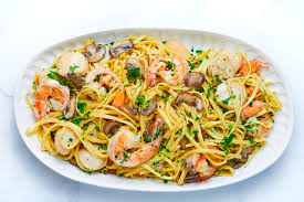 Serve and enjoy an amazing seafood pasta. Seafood Pasta With Mushroom Cream Sauce Recipe