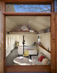 Tiny House Yes High High Shelves Though Roof Pitch Over Loft Could Be Different Love L Shape Kitchen Garage Bedroom Garage Conversion Converted Garage
