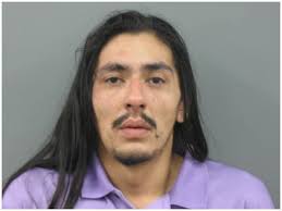 Three charged with dealing narcotics from residence