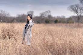 Environmental Portrait Photo Shoot Ellicia Photos Fall Female Girl Woman Moody Yellow Grass Dark Sky Creative Portrait Environmental Portraits Self Photography
