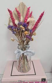 These florals are just as beautiful as their fresh counterparts. Natural Dried Flowers With Glass Vase