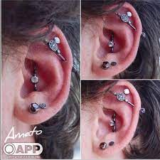 Some Folks Asked To See More Curated Ears On Guys So Here S An Awesome Setup 2 Year Old Industrial 1 Year Old Vertical Ear Ear Piercings Industrial Piercing
