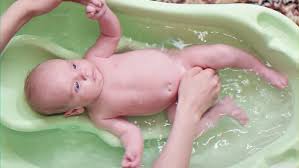 Shop buybuy baby for a fantastic selection of baby merchandise including strollers, car seats, baby nursery furniture, crib bedding, diaper bags and much more… Bathing The Baby In A Stock Footage Video 100 Royalty Free 10614053 Shutterstock