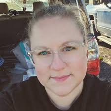 What is the name of the late 70s or early 80s movie with a big moon face  character who wears a fedora?