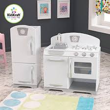 And with its durable wood construction, this kitchen will provide years of imaginative play. Amazon Com Kidkraft Retro Kitchen And Refrigerator 2 Piece White Toys Games Kidkraft Retro Kitchen Play Kitchen Sets Kids Play Kitchen