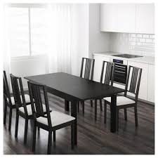 What other piece plays so many roles? Ikea Bjursta Extendable Dining Table Black Novocom Top