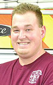 Man charged with threatening cop, choking wife