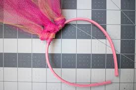 A surface mount draw latch like what you would find on a chest. How To Make A No Sew Troll Hair Headband Hgtv