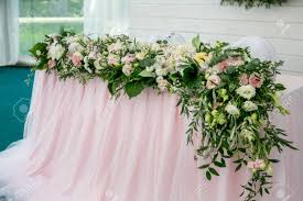 Foyers lounges restaurants reception banquets lobby vip rooms & suite rooms 4. Beautiful White Dinner Table For Newlyweds Decorated With Greenery And Long Cloth Long Flower Arrangement Of Hydrangeas Roses Gipsophiles Lilies And Greenery On A White Background Stock Photo Picture And Royalty Free