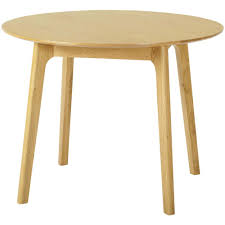 The turned legs and bottom shelf feature a matte black finish with the round top in. Royal Oak Round Dining Table Wood Furniture Store Grimsby