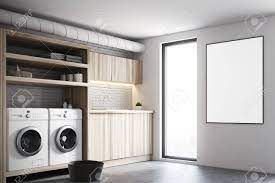 That modern farmhouse laundry room transformation maybe the only thing you need to keep the enjoyable feeling of doing your laundry. Modern Laundry Room Interior With White And Brick Walls Wooden Stock Photo Picture And Royalty Free Image Image 87045137