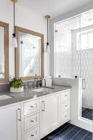 Bathroom With Grey Quartz Countertop White Cabinets And Unique Flooring And Wall Tile Batthroom B Bathroom Interior Design Bathroom Interior Bathroom Design
