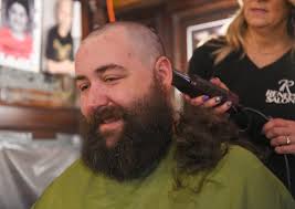 Once more, with feelings: Kitty Hoynes hosts St. Baldrick's shave for 20th  year (Editorial Board Opinion)