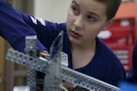 Grand Blanc East Middle School starts VEX Robotics team, takes home award  in first competition