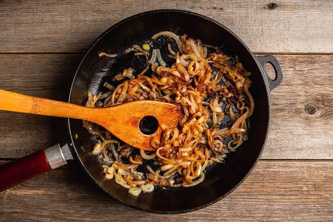 a skillet of deep golden-brown caramelized onions