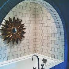 These towel display ideas will bring pretty and practical storage to your bathroom. Tub Alcove Design Ideas