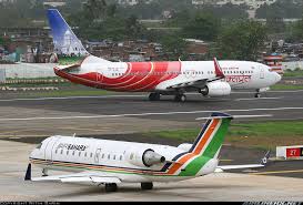 Two Vibrant Liveries In The Same Frame An Air Sahara Crj 200er A Air India Express B738 Air India Express Air India Aviation