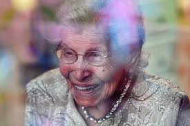 Okemos woman celebrates 101st birthday through a window