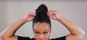 Many women choose not to experiment with protective styles for short natural hair since they aren't if you have hair that's long enough to be gathered into a bun, use this as your protective hairstyle for short natural hair. Natural Hair Styles The High Bun Hack For Short Hair Curlynikki Natural Hair Care