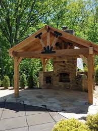 Diy backyard pavilion have an option to make it yourself. A Backyard Pavilion With A Fireplace Serves As A Multi Purpose Outdoor Living Space Ozco Building Products