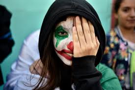 Film goers watch the dark knight featuring heath ledger during a public tribute outdoor movie night to the late actor at burswood park on february. The Smile Of Chaos Why The Joker Has Become An Icon Of Worldwide Protests Teller Report