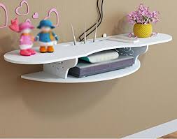 They provide a little glamour and sophistication to a bedroom and are ideal for storing shoes, a handbag collection, or extra bedding. Free Punch Shelves Tv Set Top Box Remote Control Storage Box Living Room Tv Wall Shelf Bedroom Wall Mounted Shelf Router Partition Living Room Wall Shelf 812210cm Buy Online In Dominica At Dominica Desertcart Com Productid 65859833